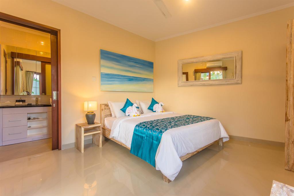 Villa Tepi Sungai Legian Szoba fotó