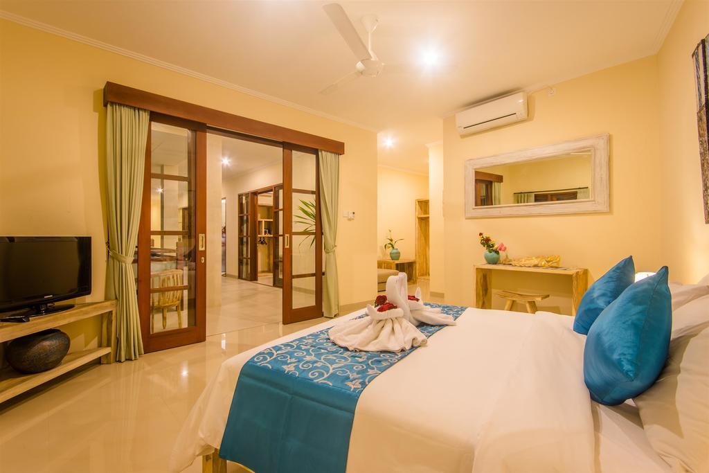 Villa Tepi Sungai Legian Szoba fotó