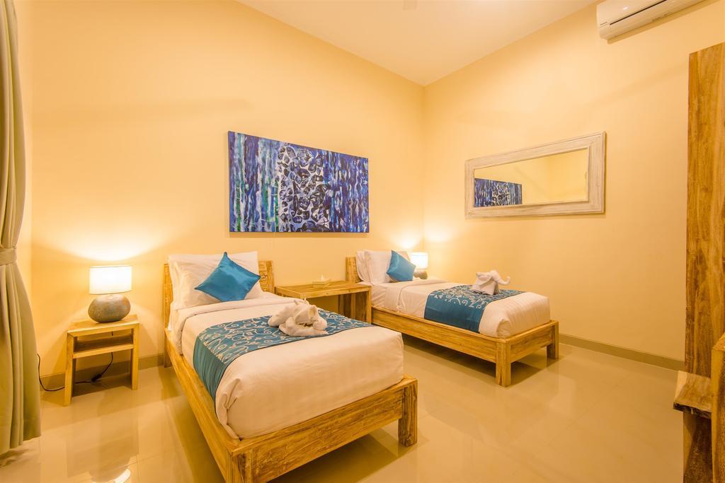 Villa Tepi Sungai Legian Szoba fotó