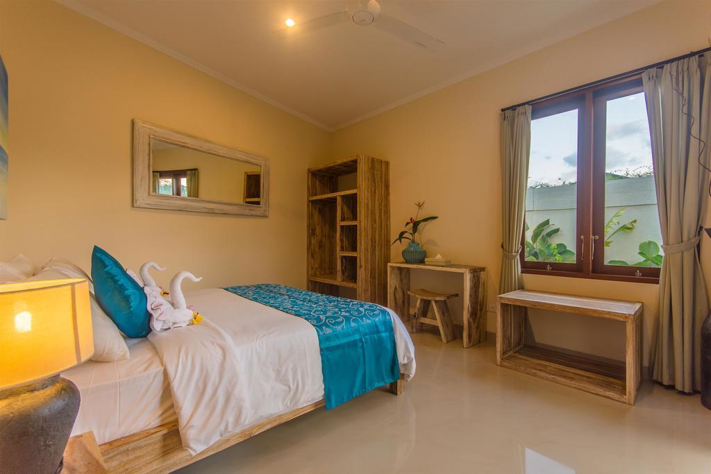 Villa Tepi Sungai Legian Szoba fotó