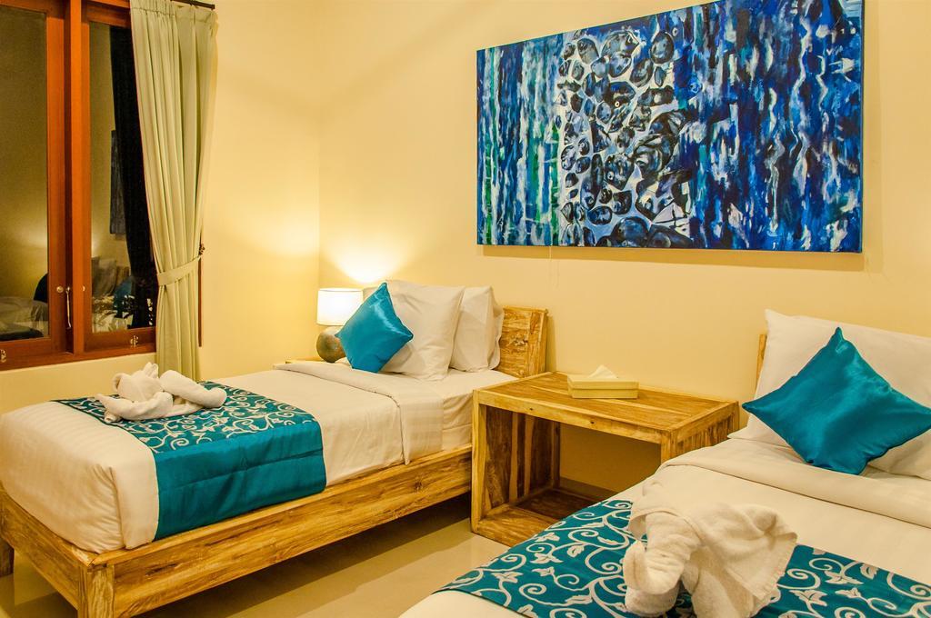Villa Tepi Sungai Legian Szoba fotó