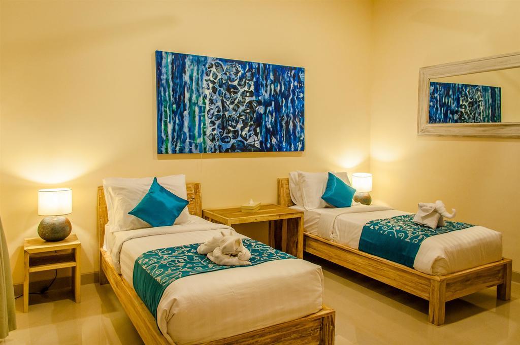 Villa Tepi Sungai Legian Szoba fotó